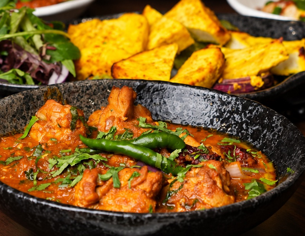Indian food shared around a table